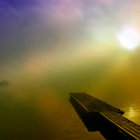 Serene Beach Scene with Driftwood and Sunset Clouds