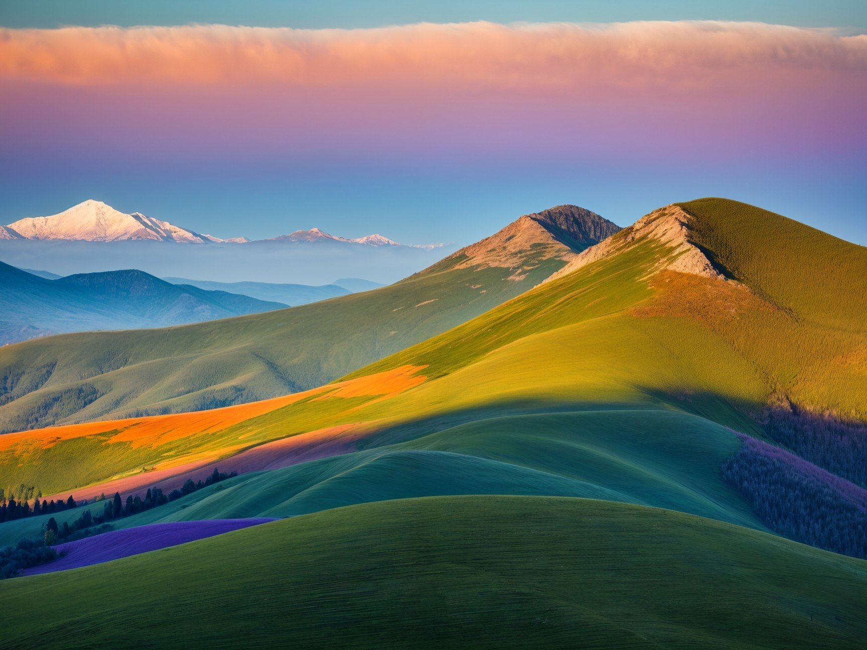 Vibrant Rolling Hills and Snow-Capped Mountains Landscape