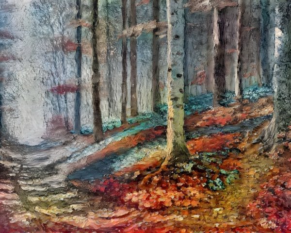 Vibrant forest path with autumn foliage and mist