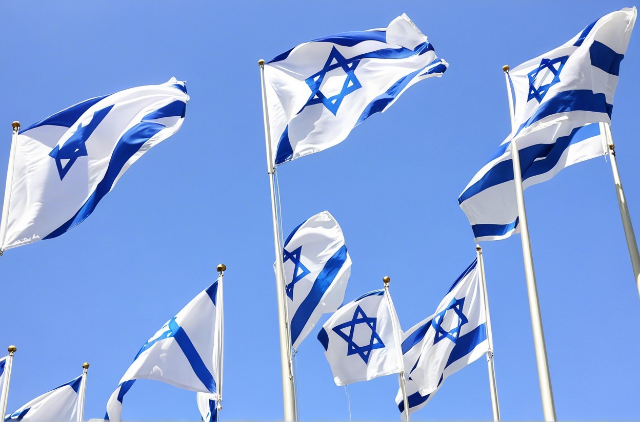 Israeli Flags Waving Against a Clear Blue Sky