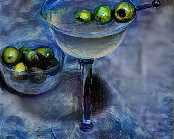 Cocktail Glass with Light Drink and Green Olives