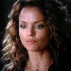 Close-Up Portrait of a Woman with Brown Hair and Green Eyes