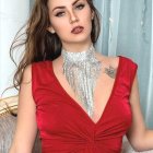 Elegant Woman in Red Dress with Stunning Necklace