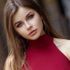 Portrait of a woman with long hair and radiant skin