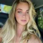 Close-up Selfie of Woman with Blonde Hair and Makeup