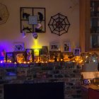 Cozy Halloween Scene with Jack-o'-Lanterns and Cats