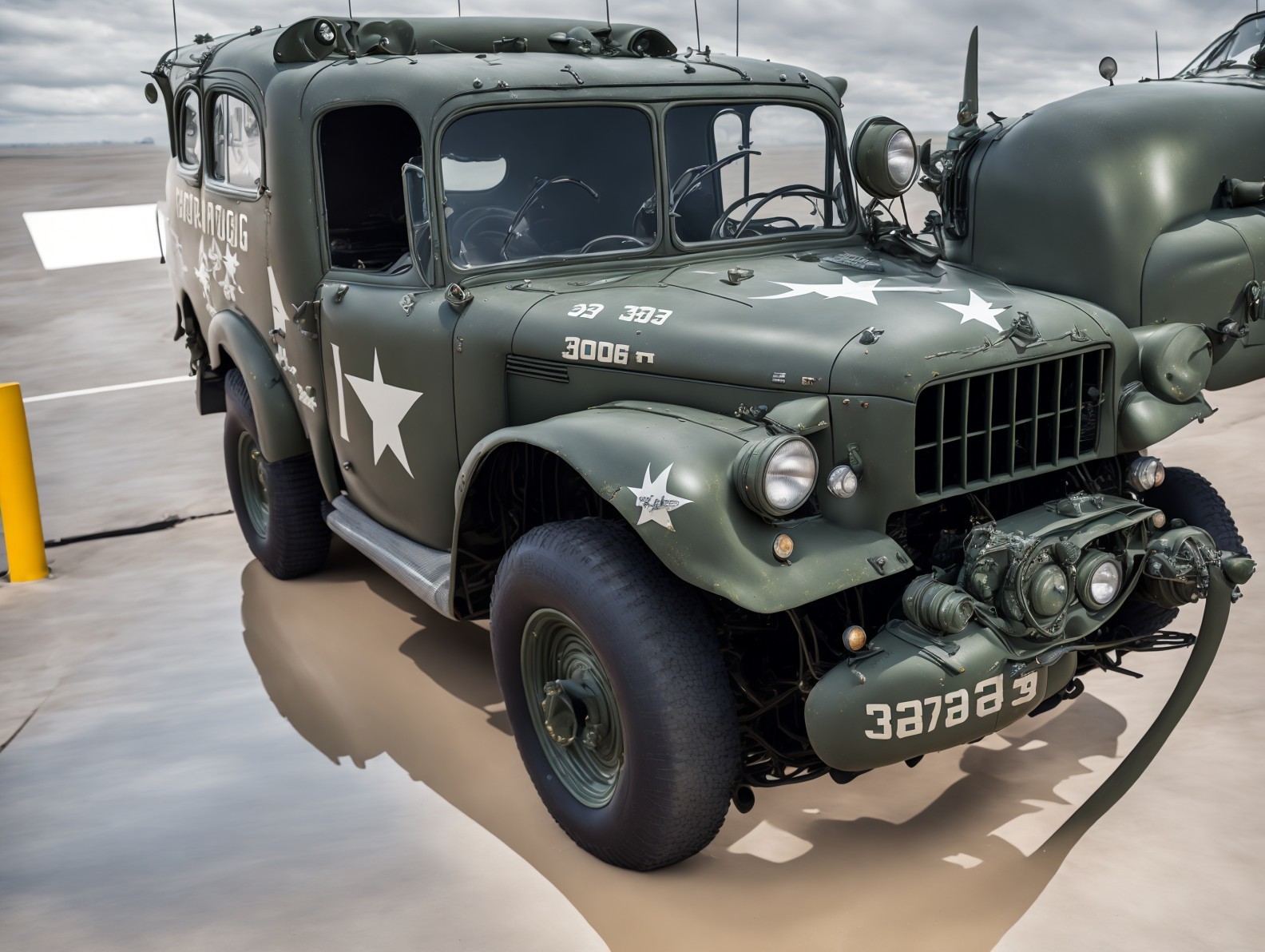 Vintage Military Vehicle with Olive Green Exterior