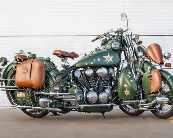 Vintage Motorcycle with Green Paint and Chrome Engine