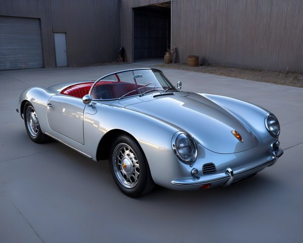 Classic Silver Sports Car with Chrome Accents and Leather Interior