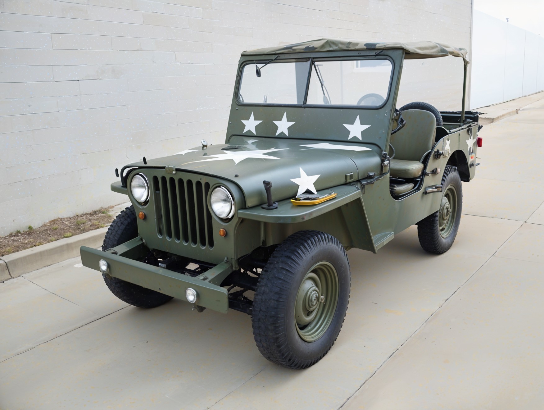 Vintage Military Jeep in Olive Green with Stars
