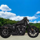 Sleek Olive Green Motorcycle Against Blue Sky