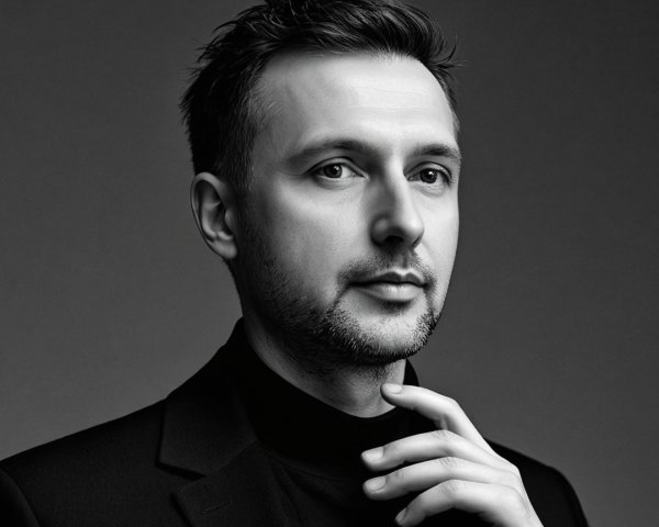Close-Up Portrait of a Man in Black Turtleneck