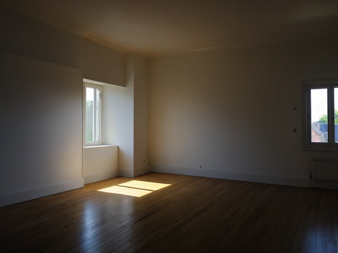 Spacious Empty Room with Wooden Flooring and Light
