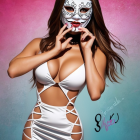 Elegant Woman in Intricate White Mask with Gradient Background