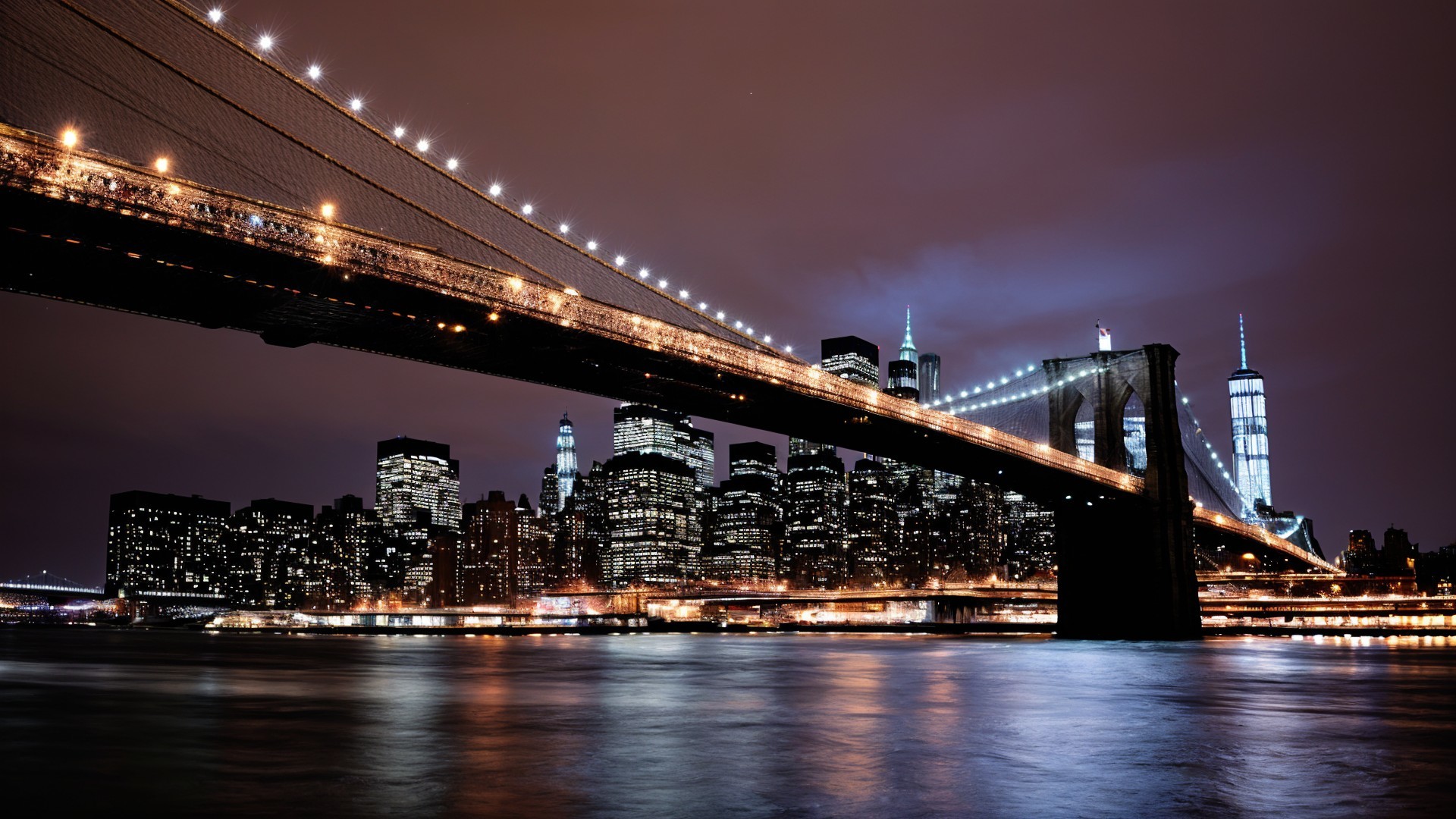 Brooklyn Bridge Night View with NYC Skyline and River