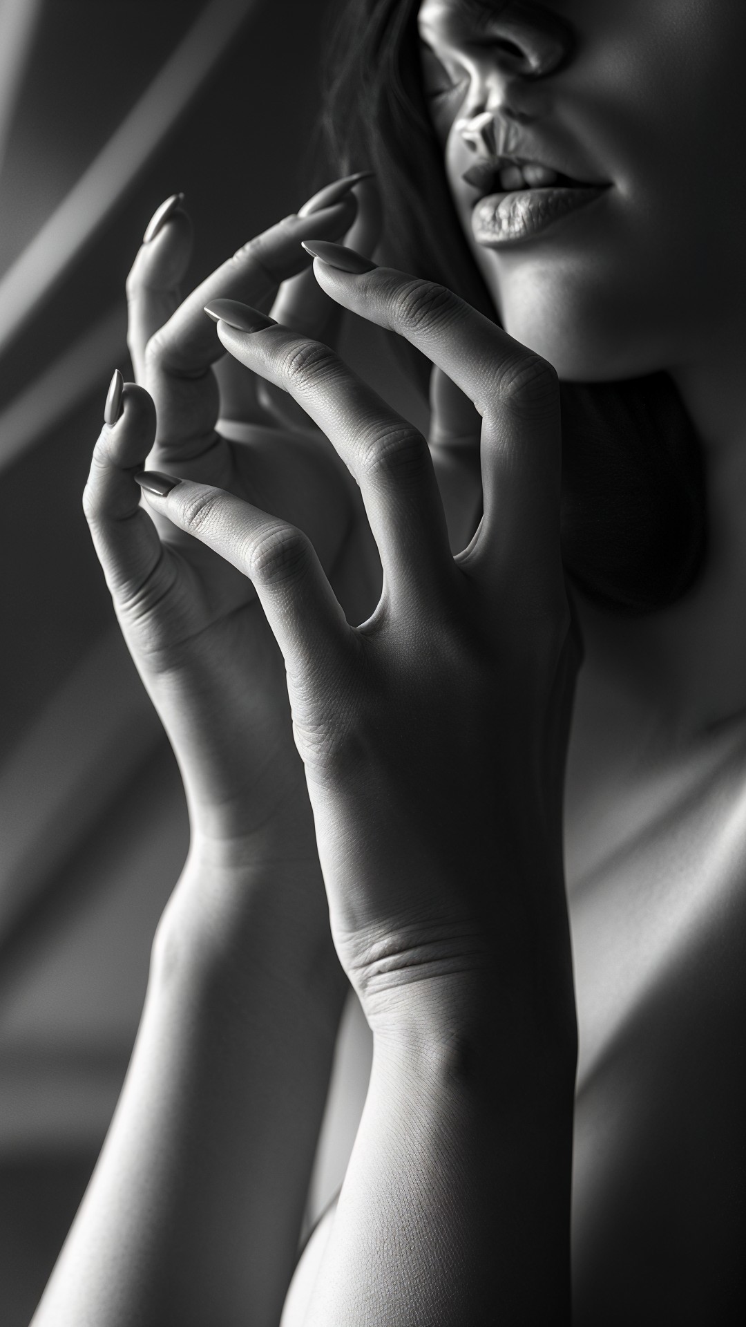 Close-Up of Woman's Hands and Face in Black and White