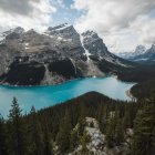 Rugged Mountains and Turquoise Lake in Impressionistic Style