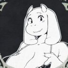 Cartoon Character with Horns and Playful Expression