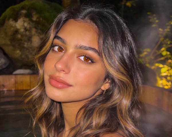 Close-up Portrait of a Woman in a Hot Tub at Night