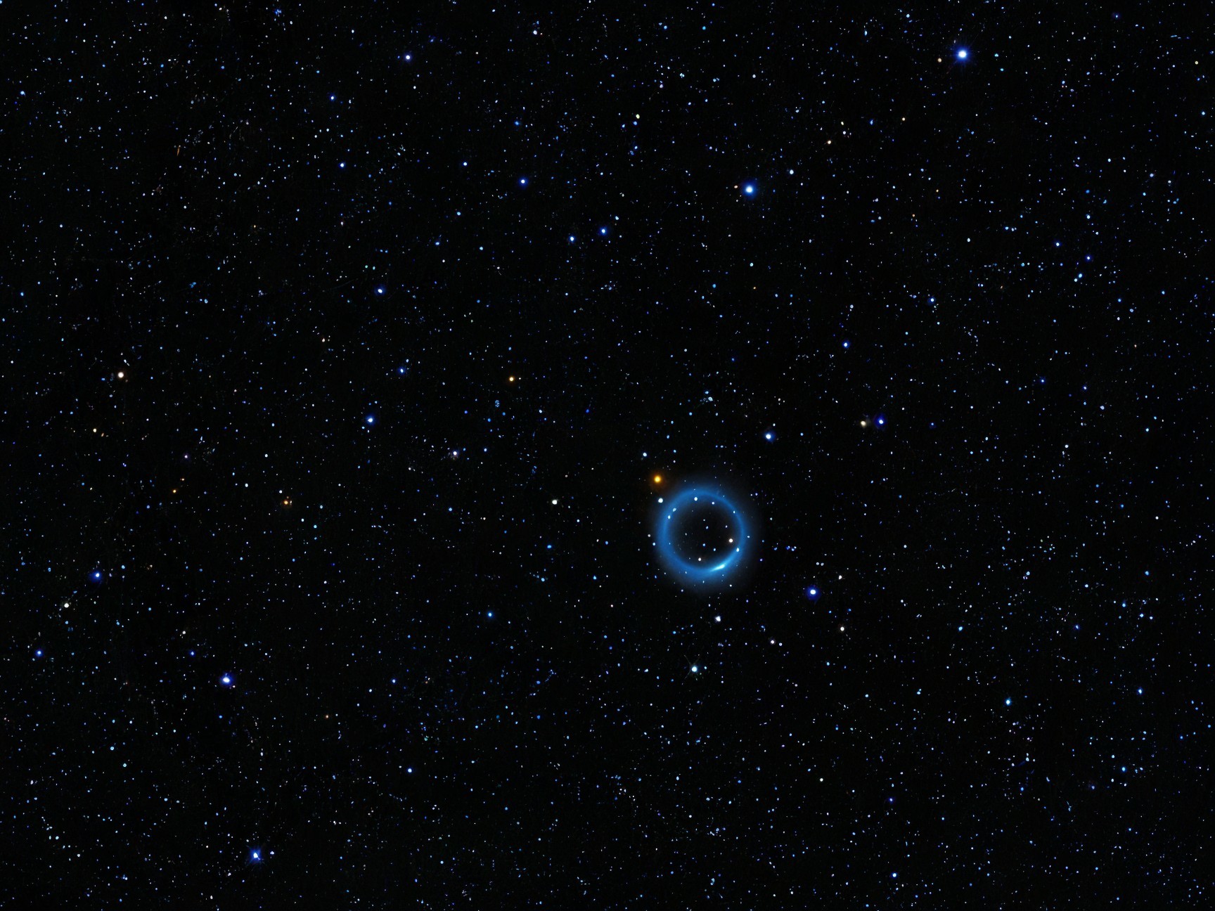 Dark Nebula Surrounded by Blue Halo and Stars