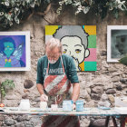 Vibrant Abstract Painting in Cluttered Studio Setting