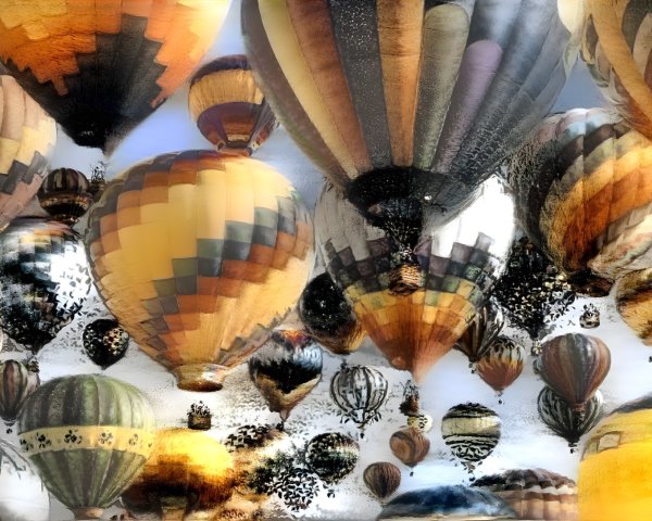 Colorful Hot Air Balloons in a Cloudy Sky Scene