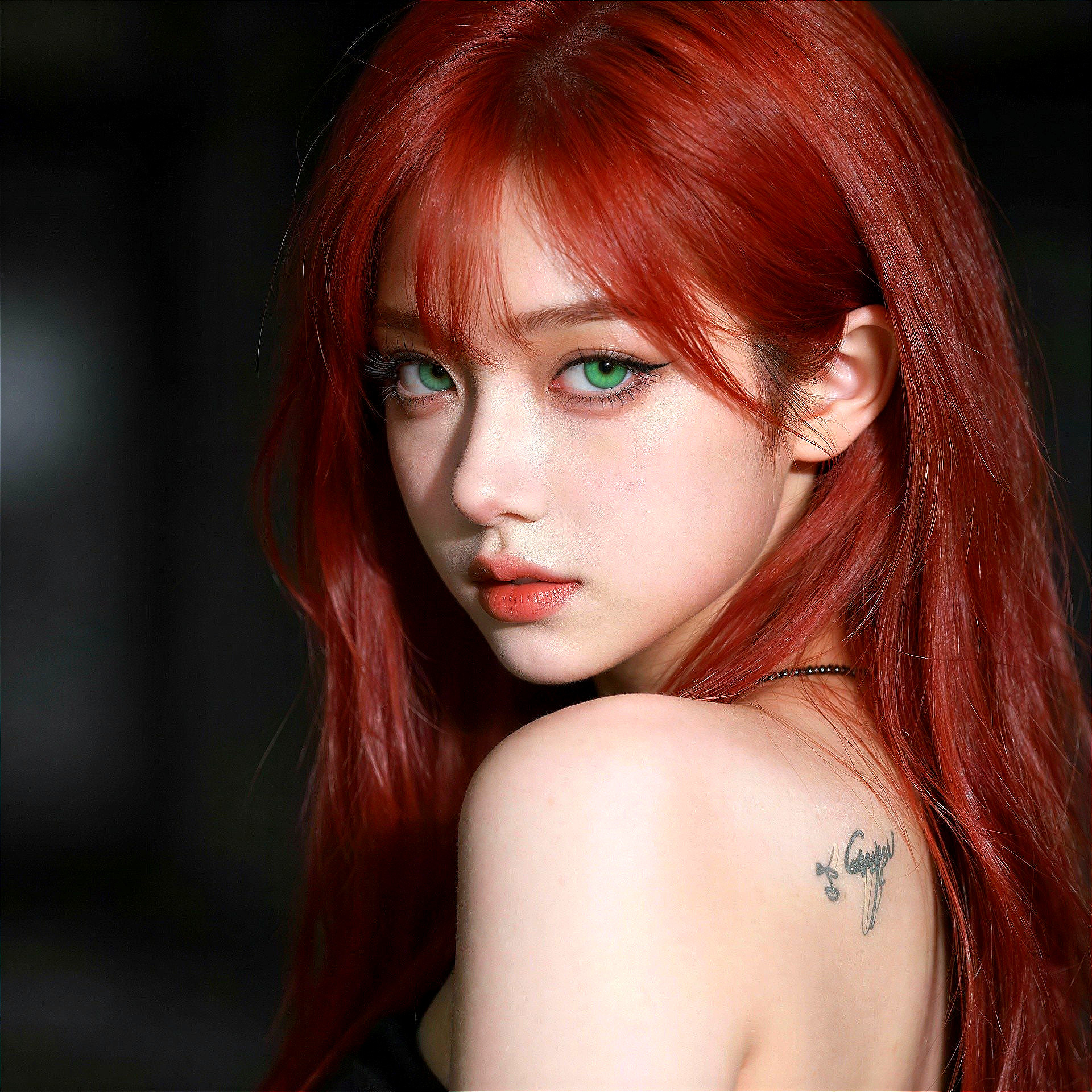Asian woman with long red hair and green eyes