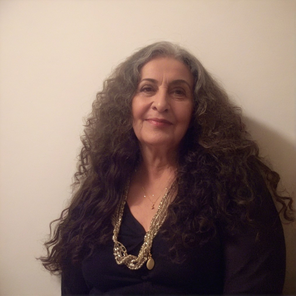 Woman with Long Curly Hair and Elegant Accessories