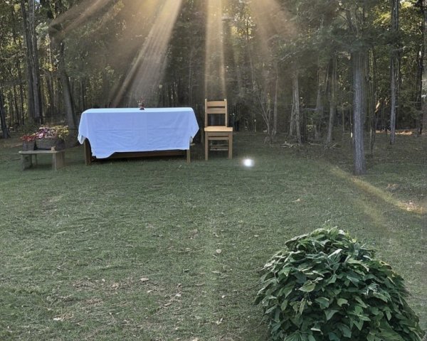 Serene Outdoor Setting with Table and Gravestone