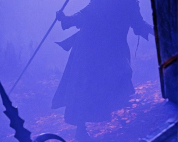 Misty Twilight Landscape with Ominous Shadowy Figure