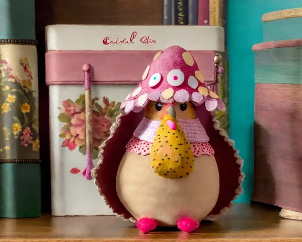 Whimsical Plush Bird Character with Mushroom Hat