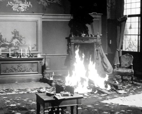 Room in Flames with Charred Wood and Decorations