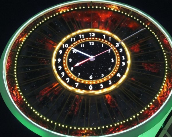 Vibrant Circular Clock Design with Starry Background
