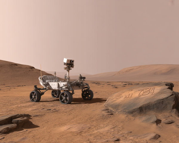 Mars Rover on Reddish Landscape with Engraved Rock