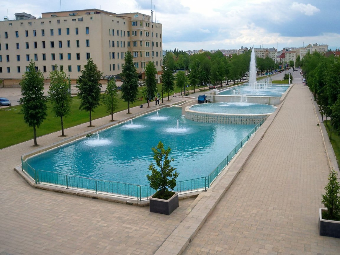 Urban Landscape with Reflective Pool and Fountains