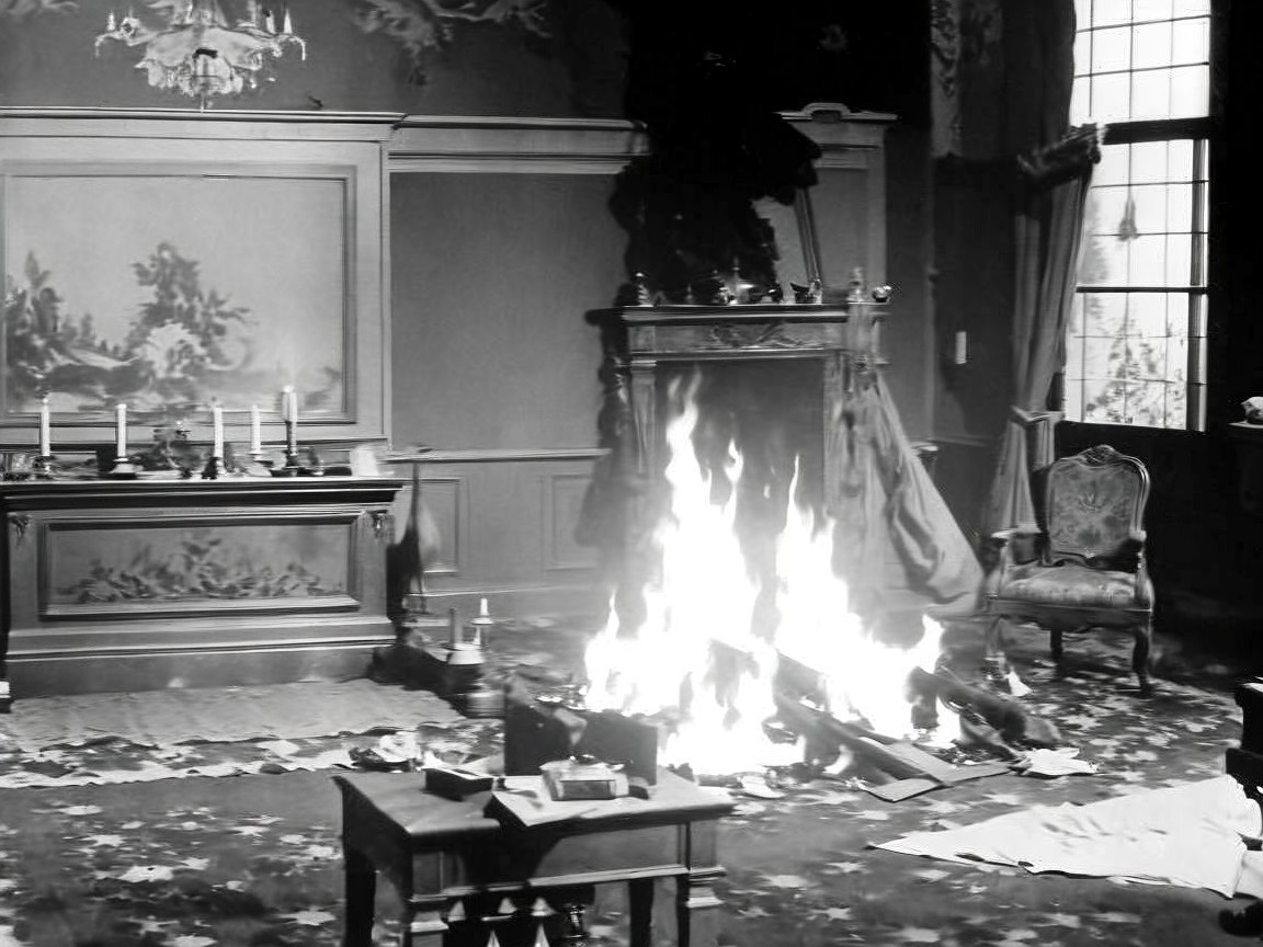Room in Flames with Charred Wood and Decorations