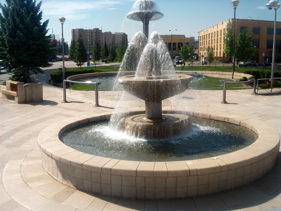 Modern multi-tiered fountain with cascading water display