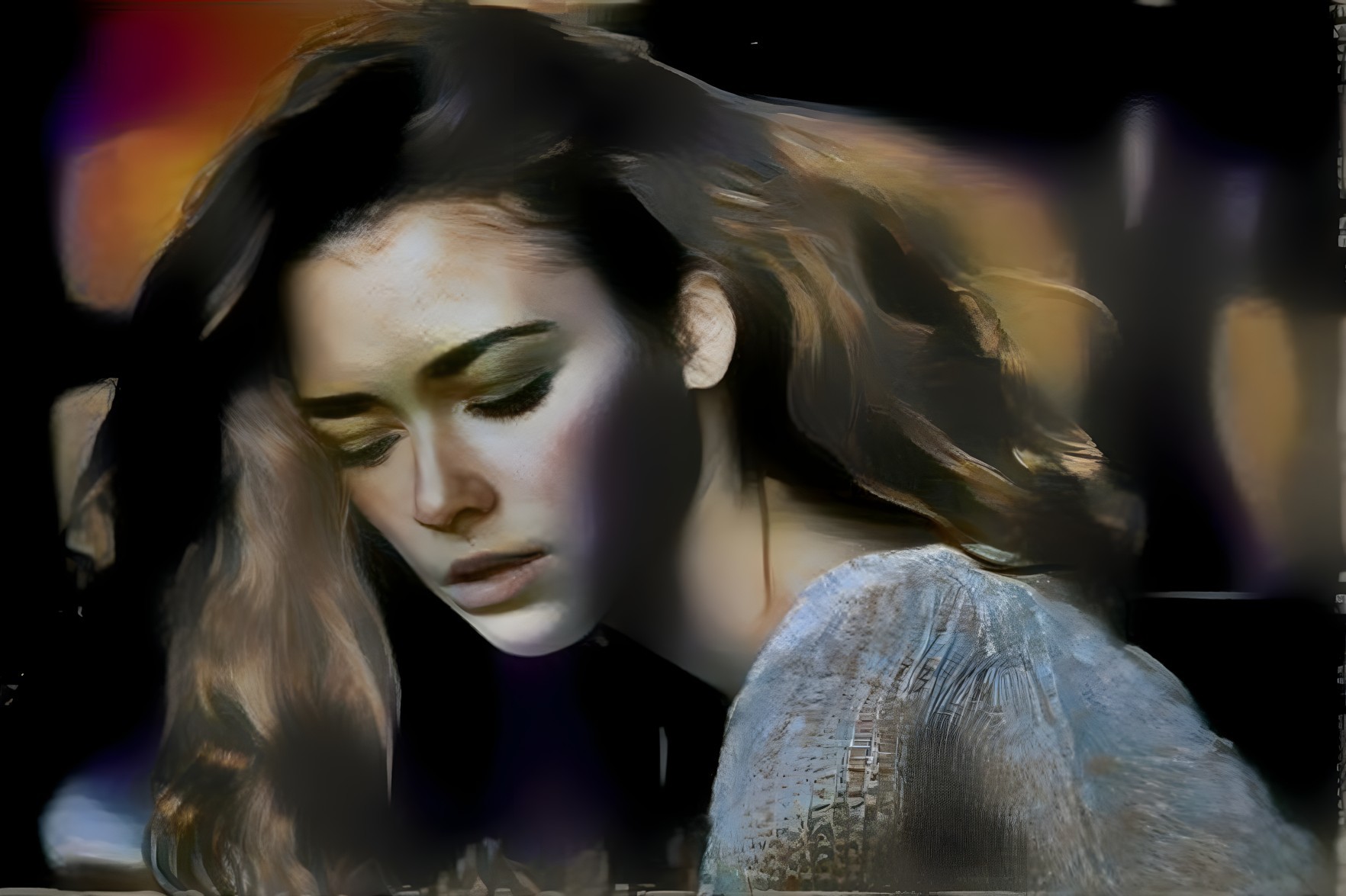 Young woman in sweater, serene expression in soft light