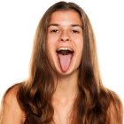 Joyful portrait of a young woman with vibrant colors