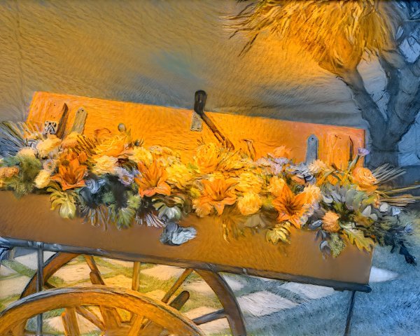 Floral Display in Orange Flowers on Rustic Cart