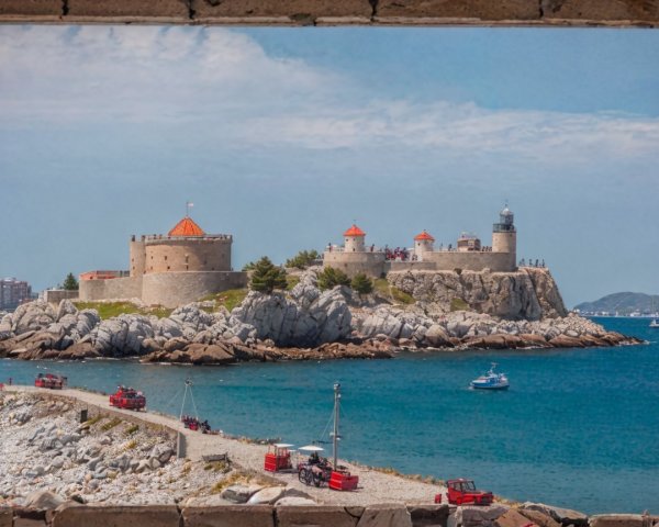Coastal Scene with Rocky Island and Historic Fortifications