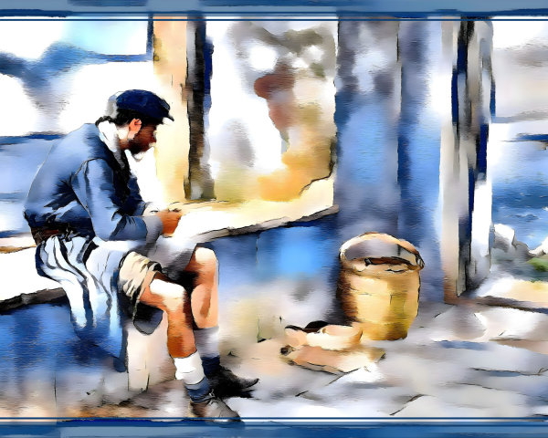 Young man in contemplation by sunlit window