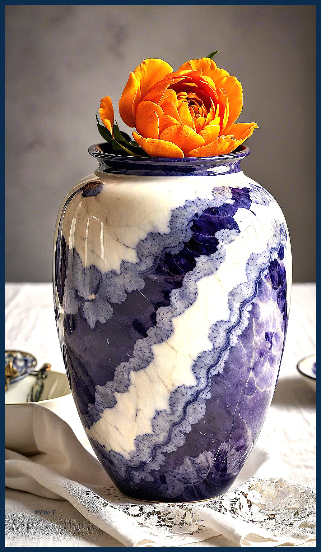 Marbled Vase with Orange Flower and Elegant Decor