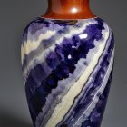 Marbled Vase with Orange Flower and Elegant Decor