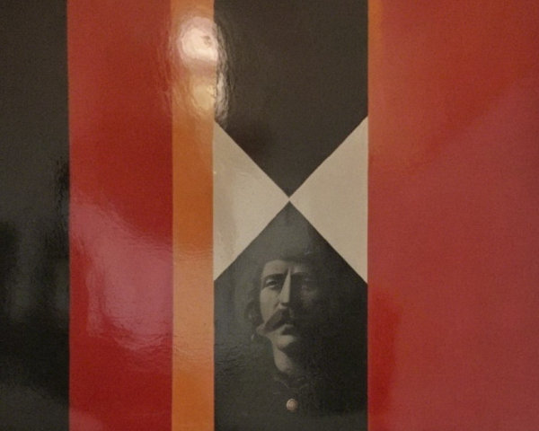 Aged Photograph of Man in Soldier Uniform with Stripes