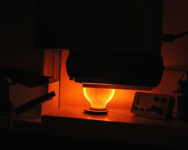 Indoor low-light shot of a glowing white bulb setup