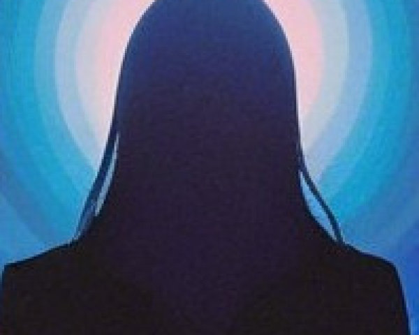 Silhouette Against Vibrant Glowing Background