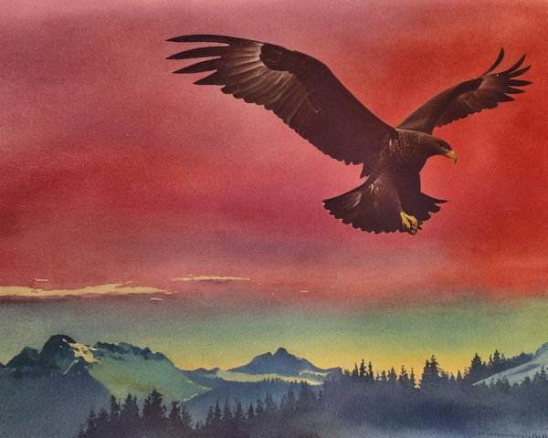 Eagle Soaring Against Vibrant Sunset Over Mountains