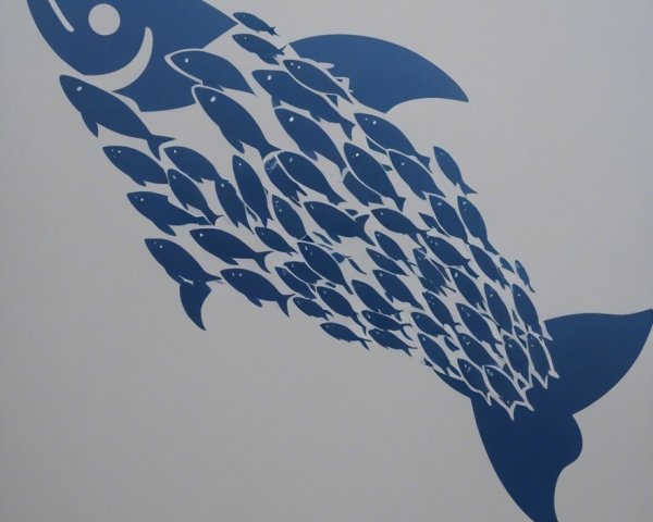 Stylized Fish Design with Smaller Fish Pattern