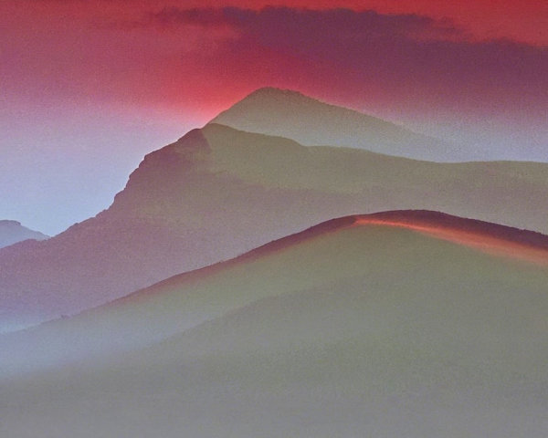 Breathtaking Landscape of Misty Mountains and Hills
